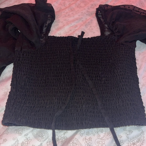 Black crop top. Very soft and had bubble sleeves that are see throught. - Picture 7 of 7